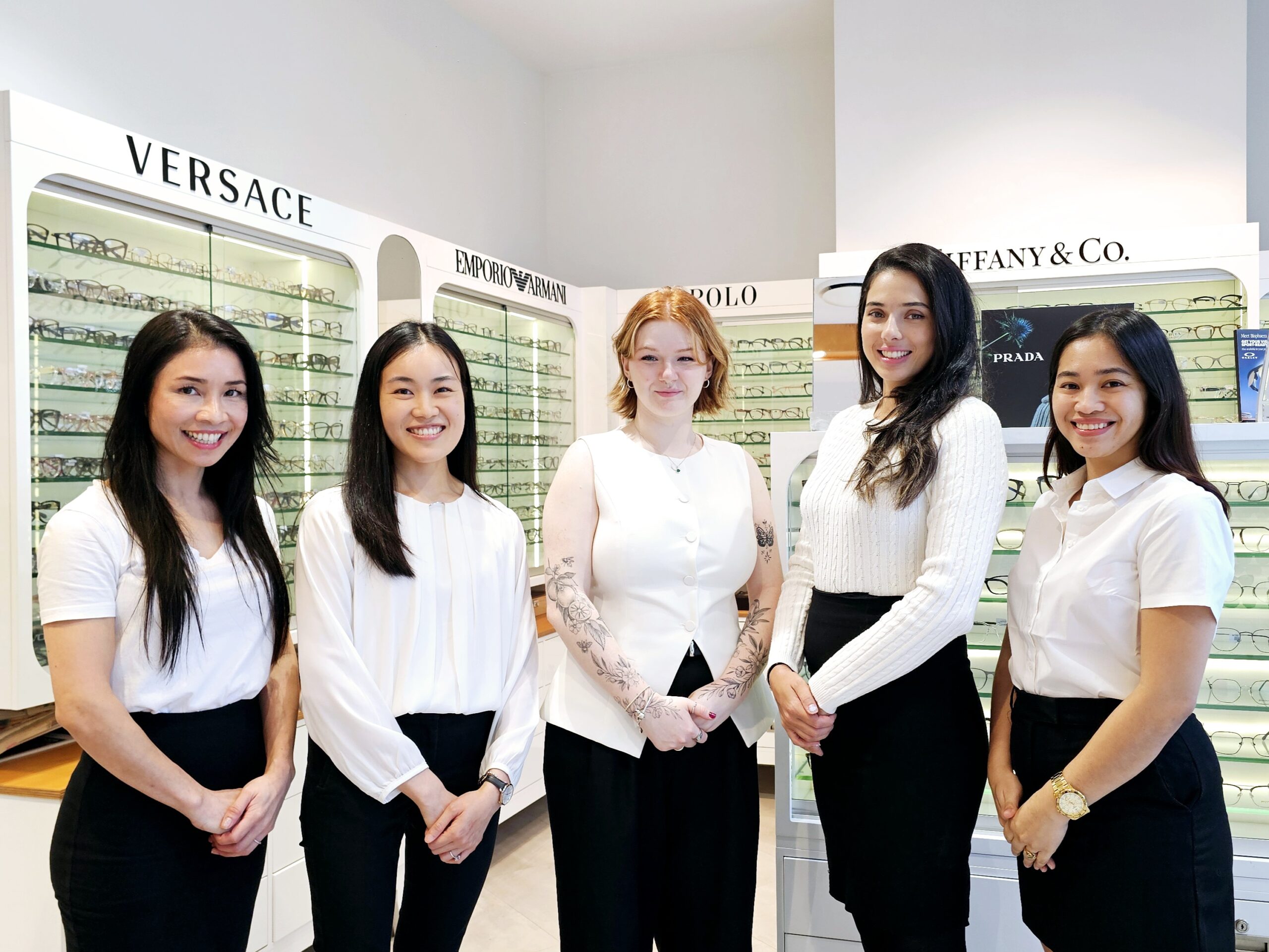 A team photo of a group of ladies who work in an optical shop