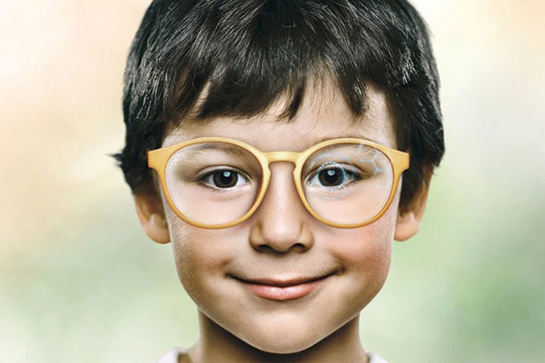 A child wearing MiyoSmart glasses